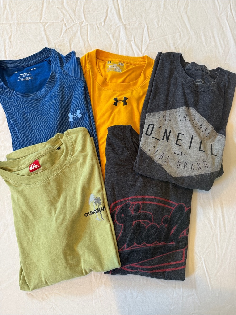 Bundle of 5 men’s t shirts, quicksilver, underarmour, O’Neill